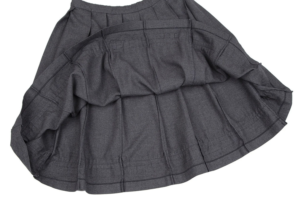 COMME des GARCONS COMME des GARCONS JAPAN. Hem Velor Line Grey Pleats Skirt