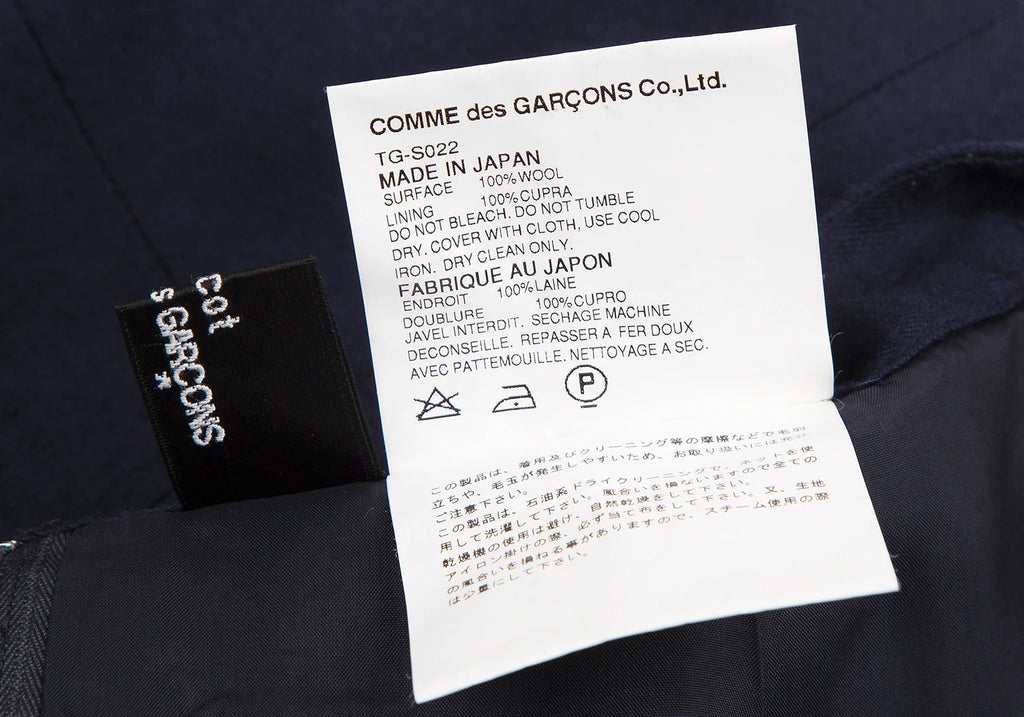 COMME des GARCONS JAPAN. TRICOT. Navy Wool Trapezoid Skirt