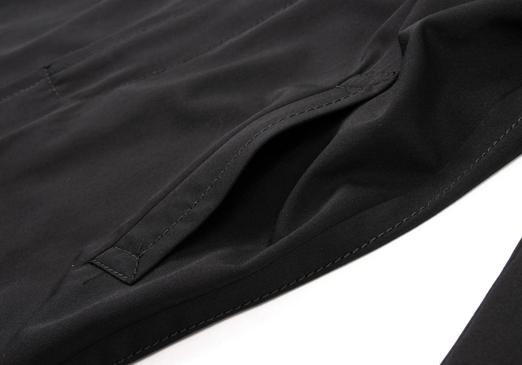 COMME des GARCONS JAPAN. Wool Stitched Black Trench Coat