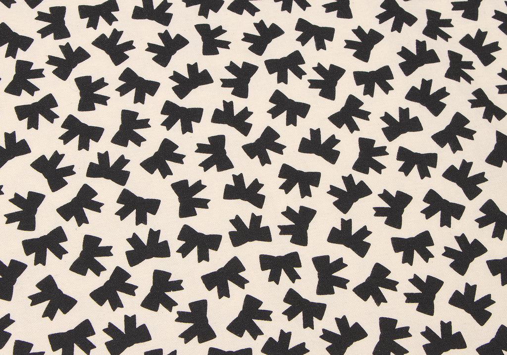 COMME des GARCONS JAPAN. TRICOT. Black/White Cotton Cut-off Ribbon Printed Skirt