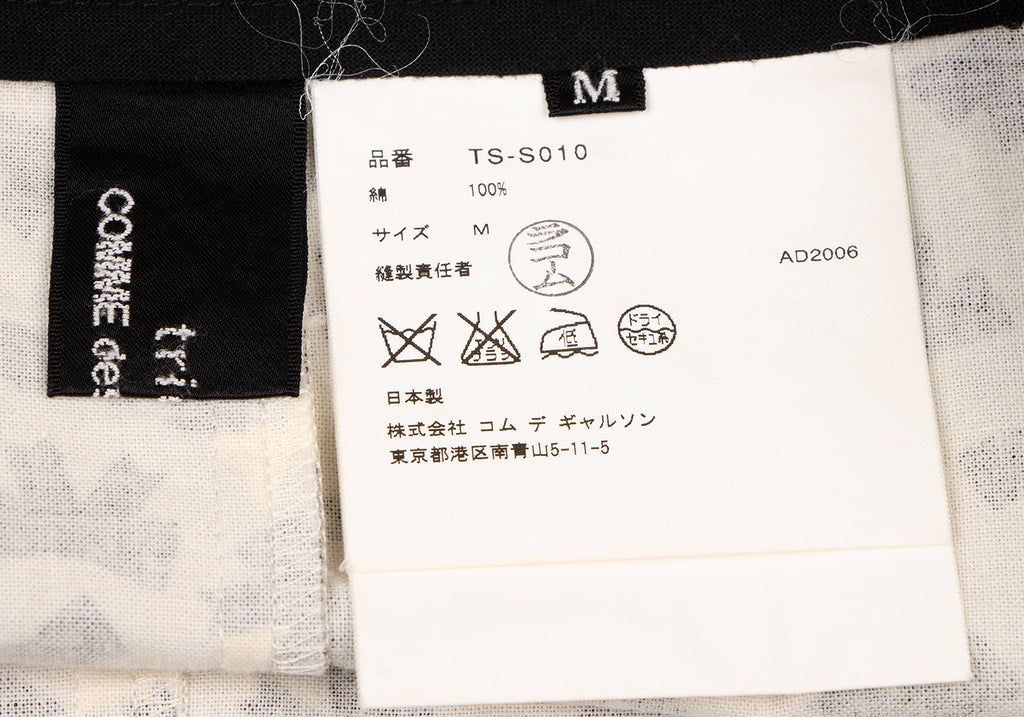 COMME des GARCONS JAPAN. TRICOT. Black/White Cotton Cut-off Ribbon Printed Skirt