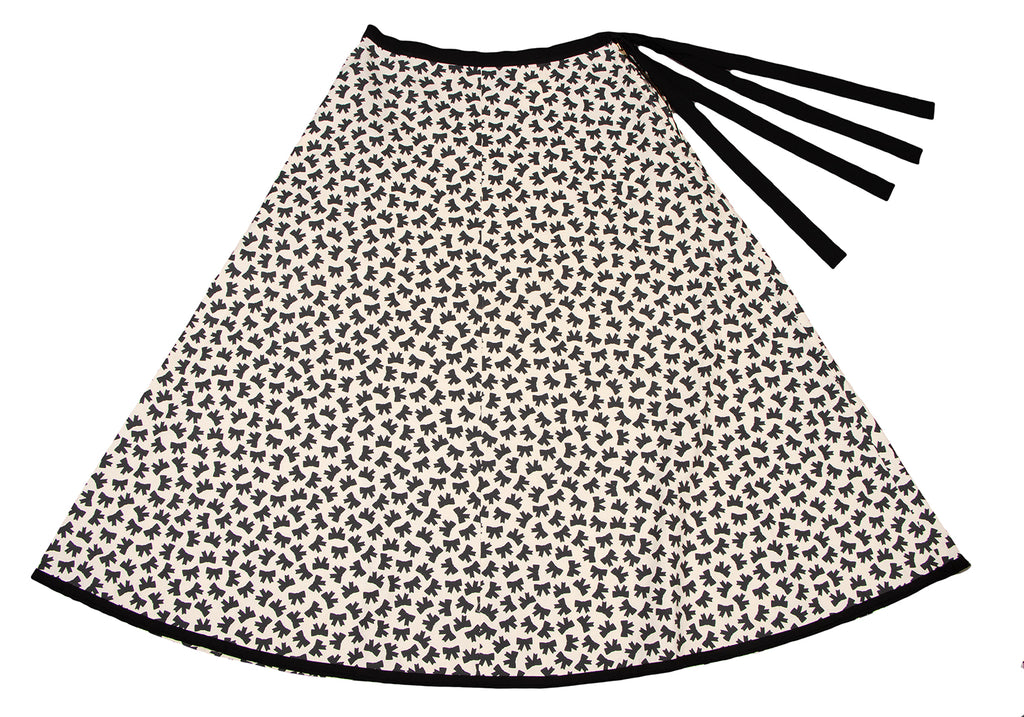 COMME des GARCONS JAPAN. TRICOT. Black/White Cotton Cut-off Ribbon Printed Skirt