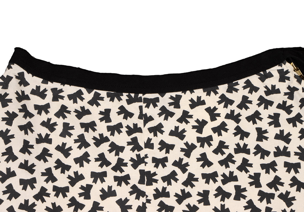 COMME des GARCONS JAPAN. TRICOT. Black/White Cotton Cut-off Ribbon Printed Skirt