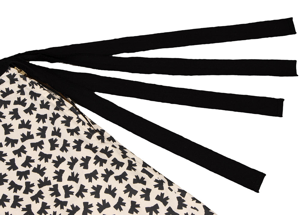 COMME des GARCONS JAPAN. TRICOT. Black/White Cotton Cut-off Ribbon Printed Skirt