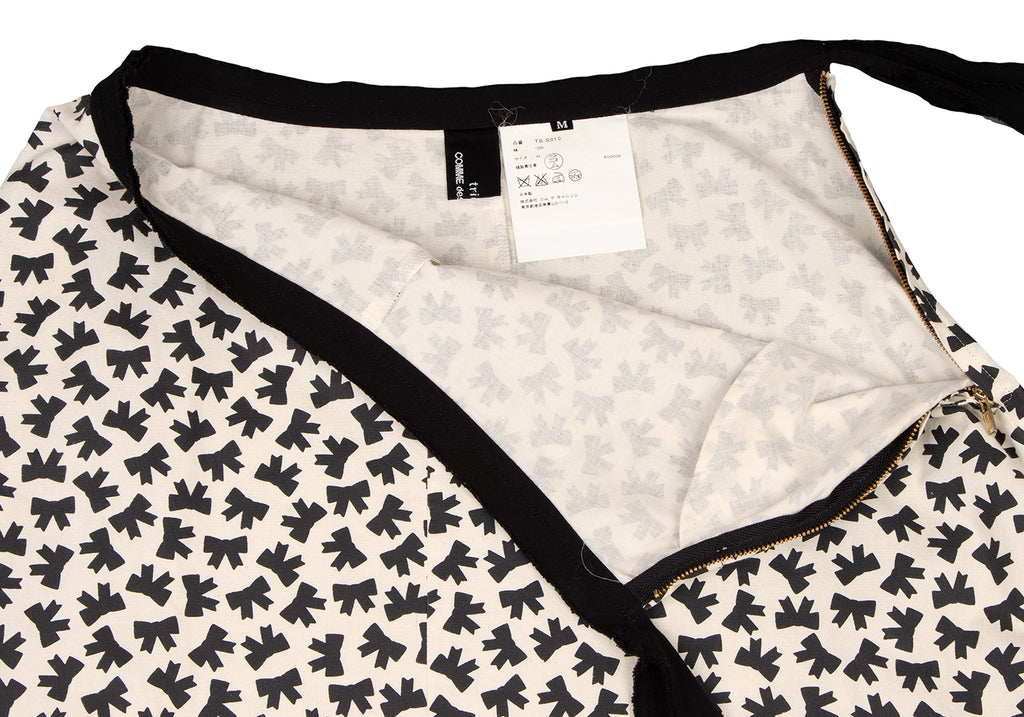 COMME des GARCONS JAPAN. TRICOT. Black/White Cotton Cut-off Ribbon Printed Skirt