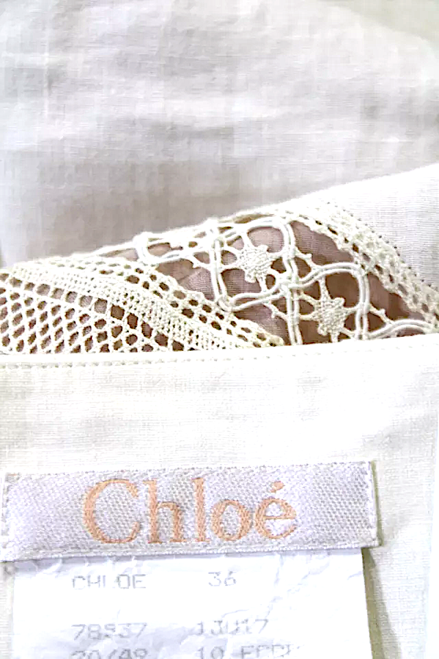 Chloe Paris. White/Beige Linen Knit Detail Knee Length Pencil Skirt