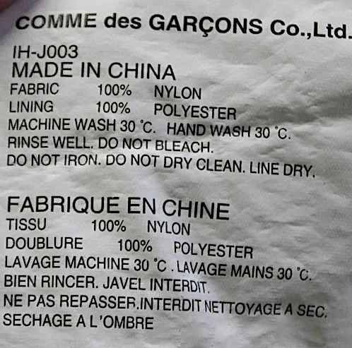 Comme Des Garcons Japan. Logo CDG Black Button Front Collared Tessuto Nylon Jacket