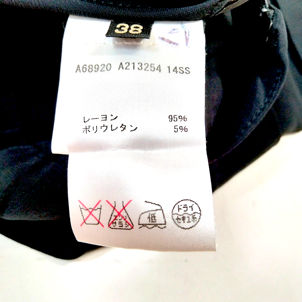 Versace Italy. Black Rayon, Polyurethane Skirt