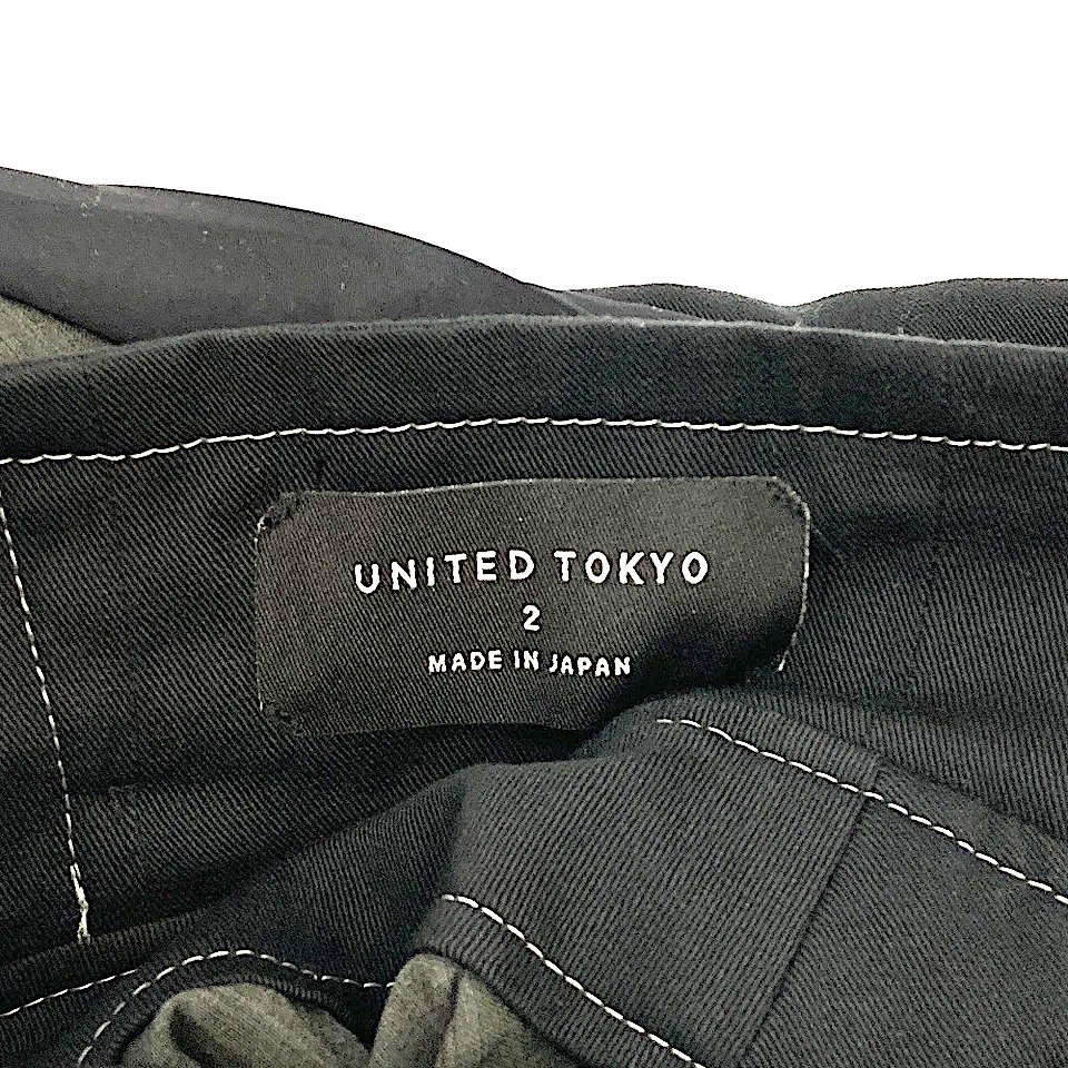 UNITED TOKYO JAPAN. Black Poly Blend Random Hem Flare Long Skirt