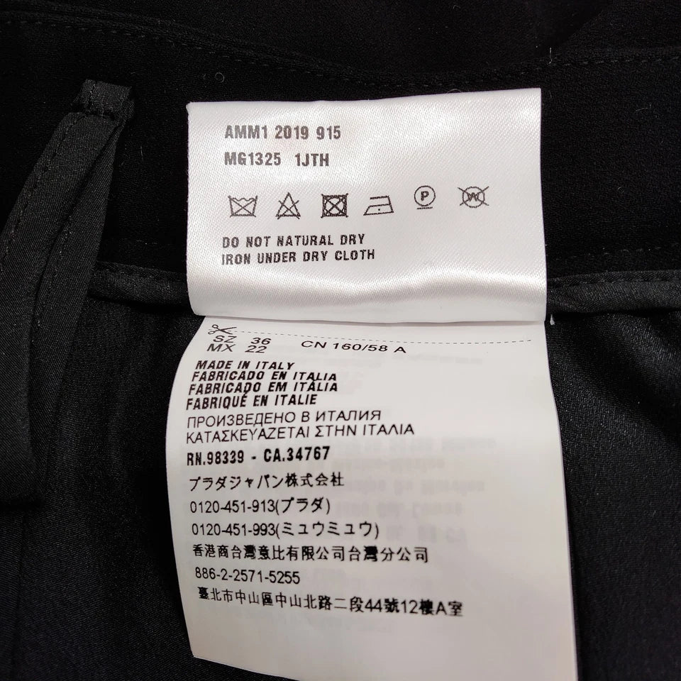 Miu Miu Italy. Black PolyTech Fabric Fit/Flare Vintage Skirt