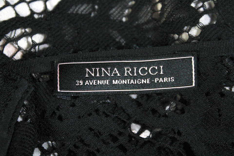 Nina Ricci Paris. Black/Neutral Lined Back Zip Sleeveless Lace Overlay Sheath Dress