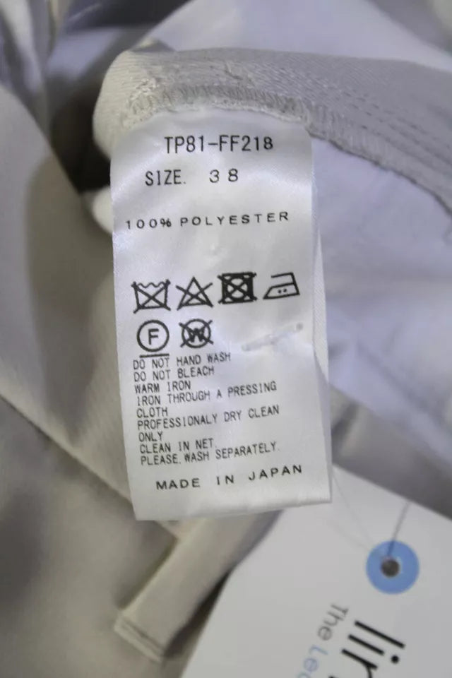 Toga Pulla Japan. Light Beige Creased High Rise Pants