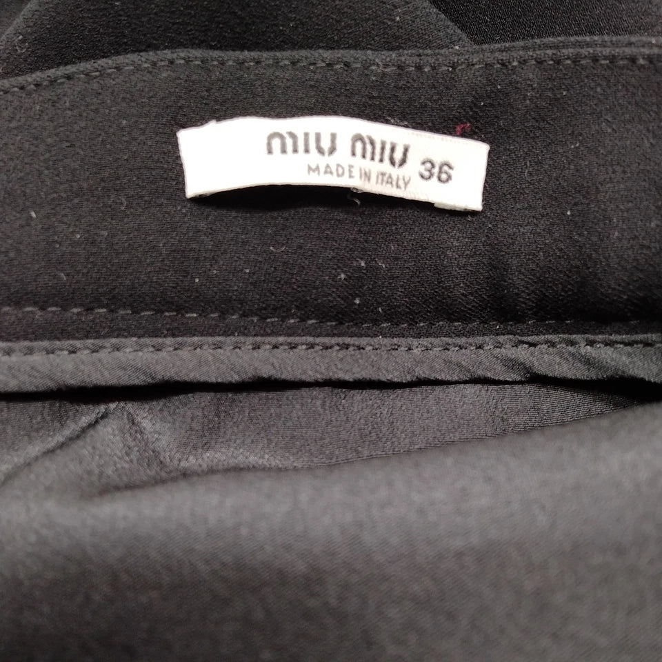 Miu Miu Italy. Black PolyTech Fabric Fit/Flare Vintage Skirt
