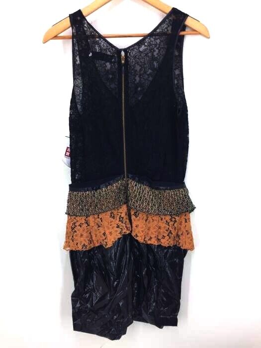 Toga Pulla Archives Japan. Mick sports lace dress