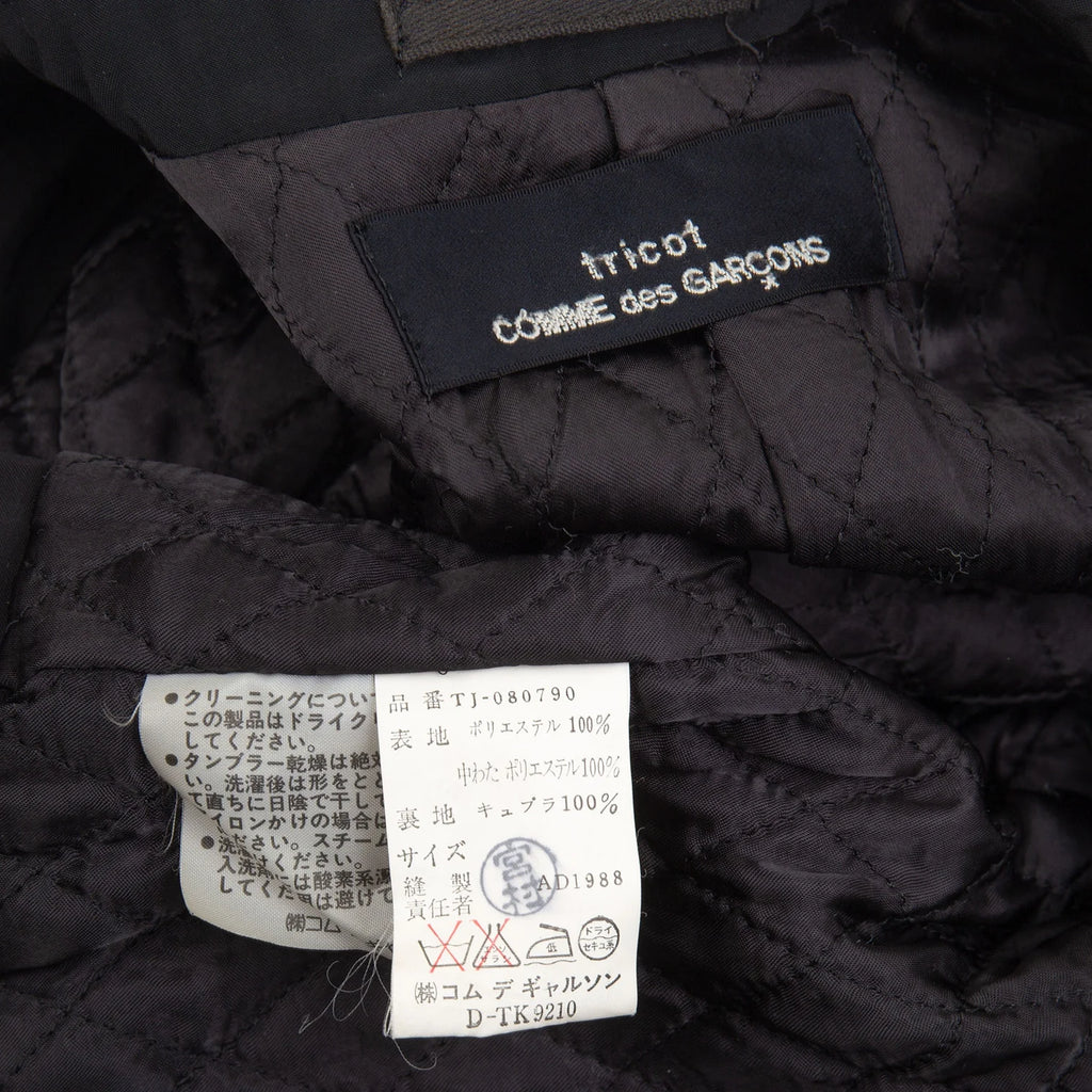 COMME des GARCONS JAPAN. TRICOT. Black Quilting Lining Cropped Short Jacket