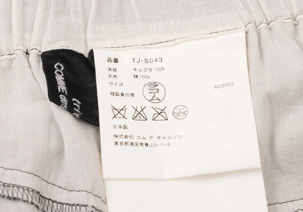 COMME des GARCONS JAPAN. TRICOT. Black Flocked Dot Switching Design Skirt