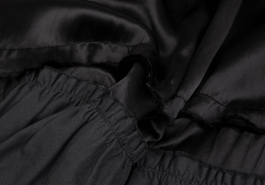 COMME des GARCONS JAPAN. TRICOT. Black Dyed Switching Skirt