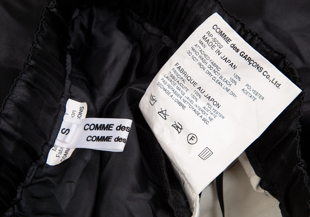 COMME des GARCONS COMME des GARCONS JAPAN. Black Poly Panel Switching Skirt