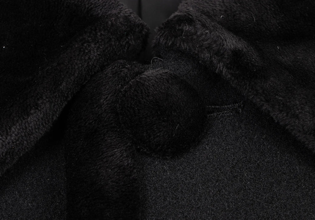 COMME des GARCONS JAPAN. TRICOT. Black Wool Material Switching Coat