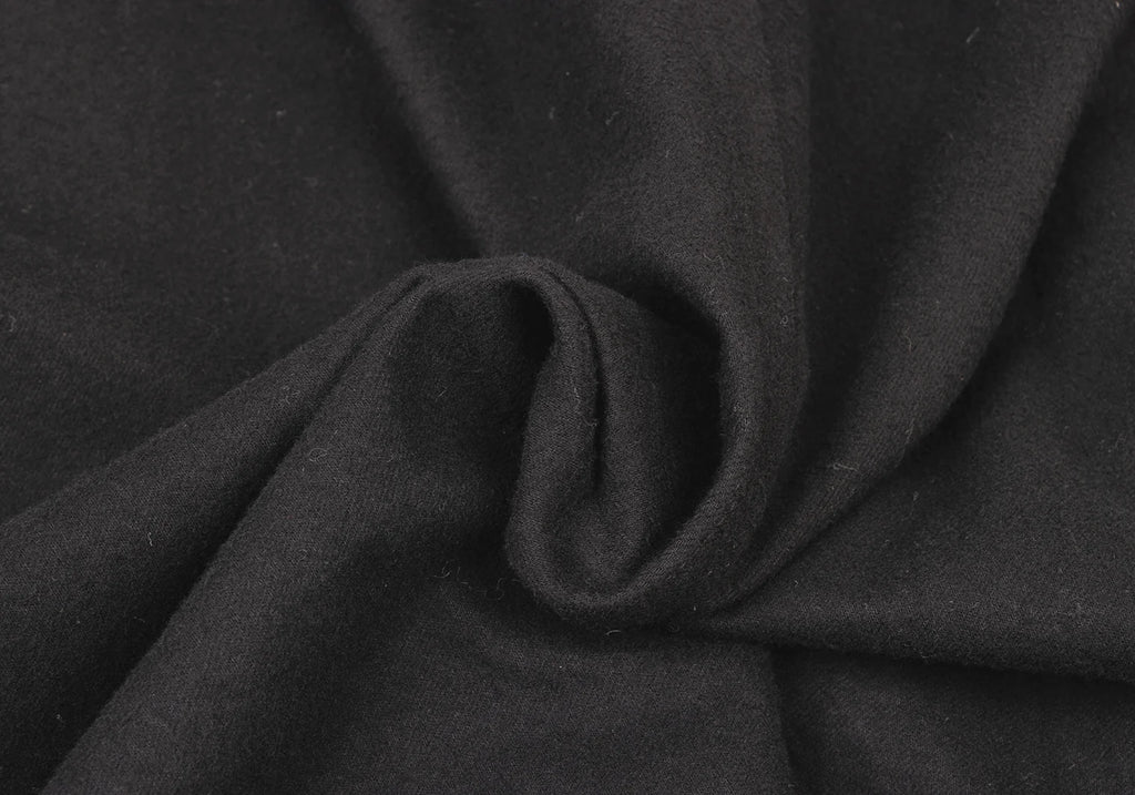 COMME des GARCONS JAPAN. TRICOT. Black Dyed Ruffle Coat