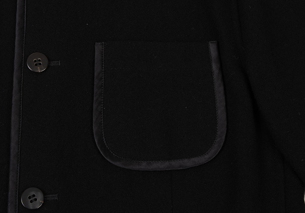 COMME des GARCONS JAPAN. TRICOT. Black Wool Collarless Piping Jacket