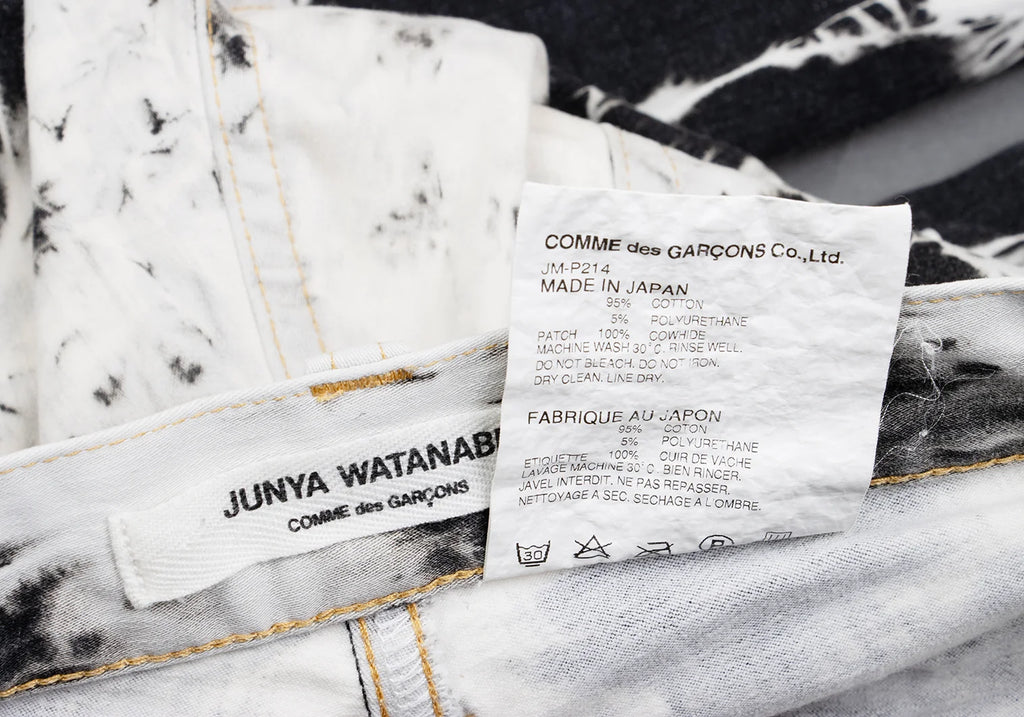 COMME des GARCONS JAPAN. JUNYA WATANABE White, Charcoal, Black Denim Bleach Printed Stretch Slim Pants
