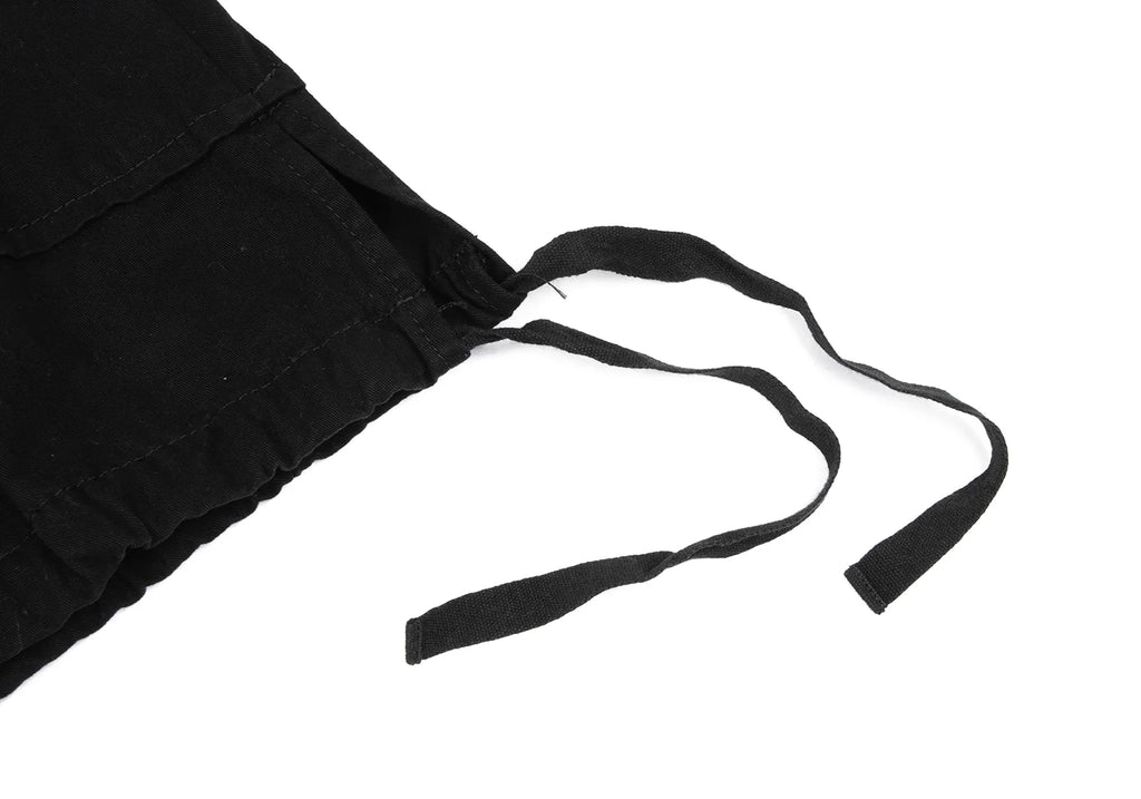 COMME des GARCONS JAPAN. Black Dyed Cotton Tuck Skirt