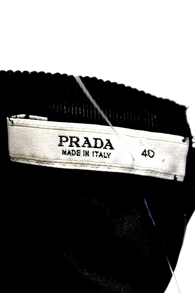 Prada Italy. Black Solid Black Crew Neck Sleeveless Zip Back Peplum Blouse Top