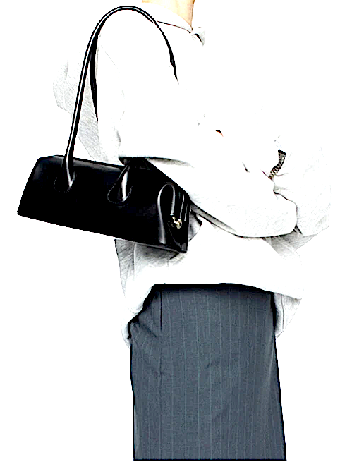 OSOI. VINTAGE NEW W/O TAG BLACK MINI BAGUETTA BAG (LOOKS LIKE ALAIA HAS COME EXPLAINING TO DO)