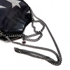 Stella McCartney UK. Black Denim Falabella Star Bag Silver Hardware Shoulder Bag