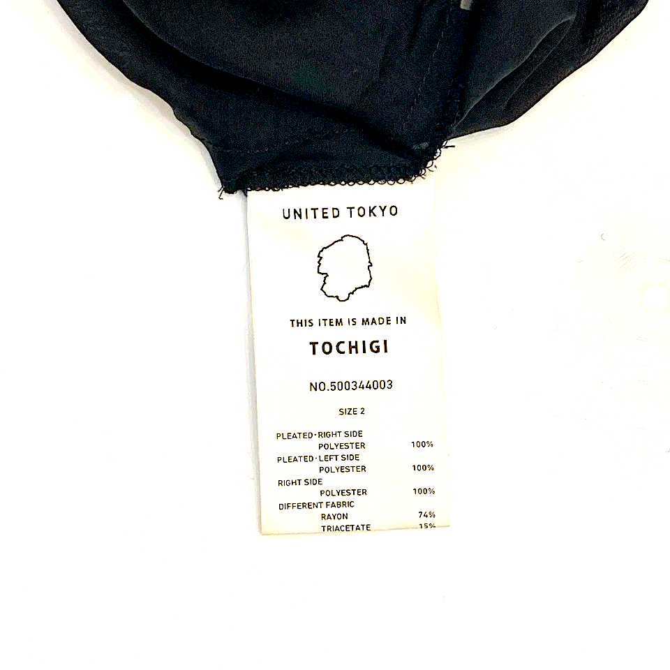 UNITED TOKYO JAPAN. Black Poly Blend Random Hem Flare Long Skirt