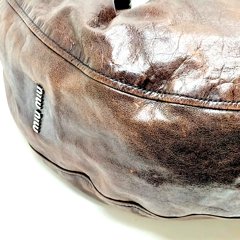 Miu Miu Italy. Dark Brown Large Distressed Leather Hobo Style Shoulderbag