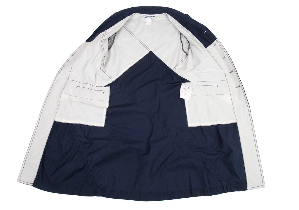 COMME des GARCONS COMME des GARCONS JAPAN. Navy Switching Cotton Coat