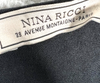 Nina Ricci Paris. Black Silk symmetrical Ruffle Midi Dress