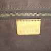Celine Paris. Vintage Mcadam Brown PVC Covered Canvas and Tan Leather Handles