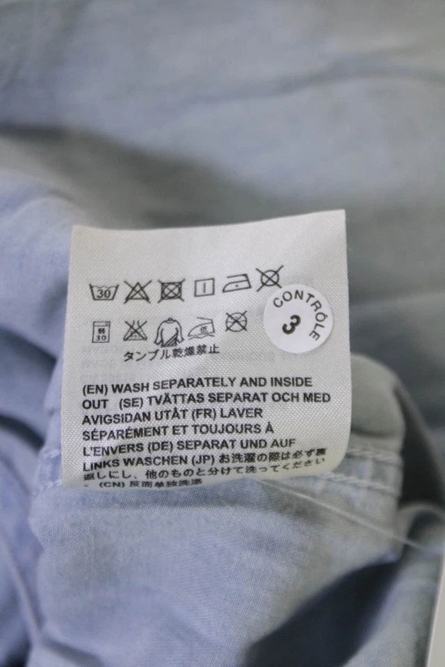ACNE Studios Sweden. Blue Chambray Collared Sleeveless Button Down Shirt