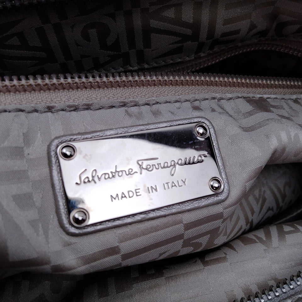 Ferragamo Italy. Gray Metallic Pebbled Leather Shoulder Bag / Hand Bag