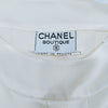CHANEL PARIS. WHITE/IVORY LINEN CHANEL BUTTONS PLEATED TOP
