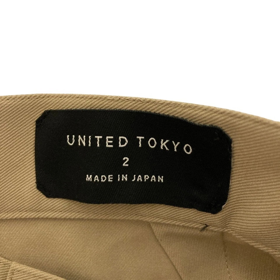 UNITED TOKYO JAPAN. Beige Layered Tie-Dye Pleated Skirt