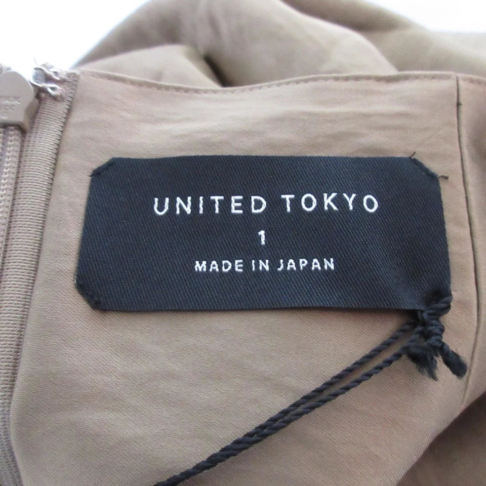 UNITED TOKYO JAPAN. Khaki Satin Asymmetrical Satin Wrap Skirt