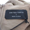UNITED TOKYO JAPAN. Khaki Satin Asymmetrical Satin Wrap Skirt
