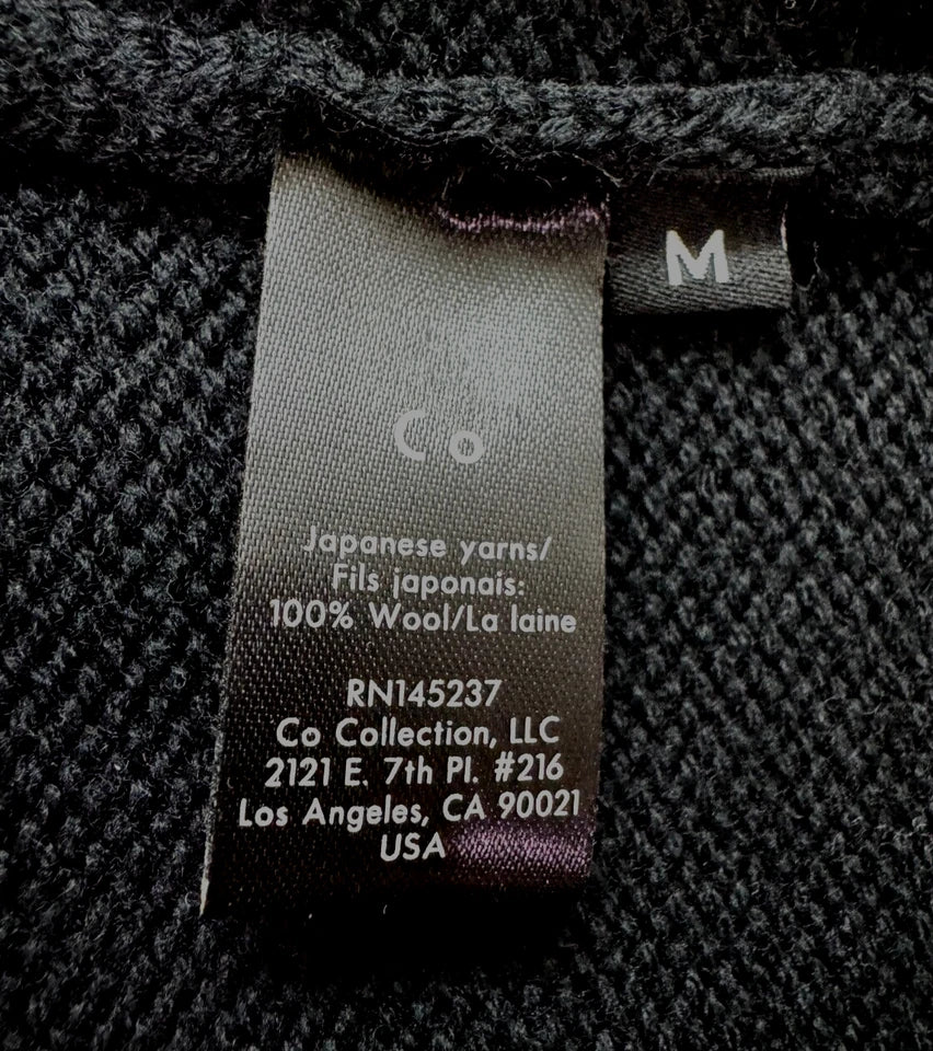 Co Japan. Japanese Yarn Black Wool Sweater with Flare Cuffs