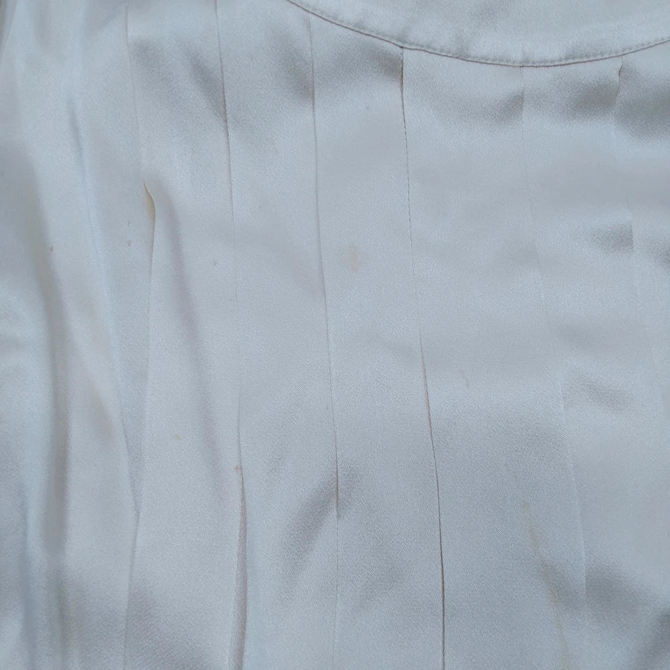 CHANEL PARIS. WHITE/IVORY LINEN CHANEL BUTTONS PLEATED TOP