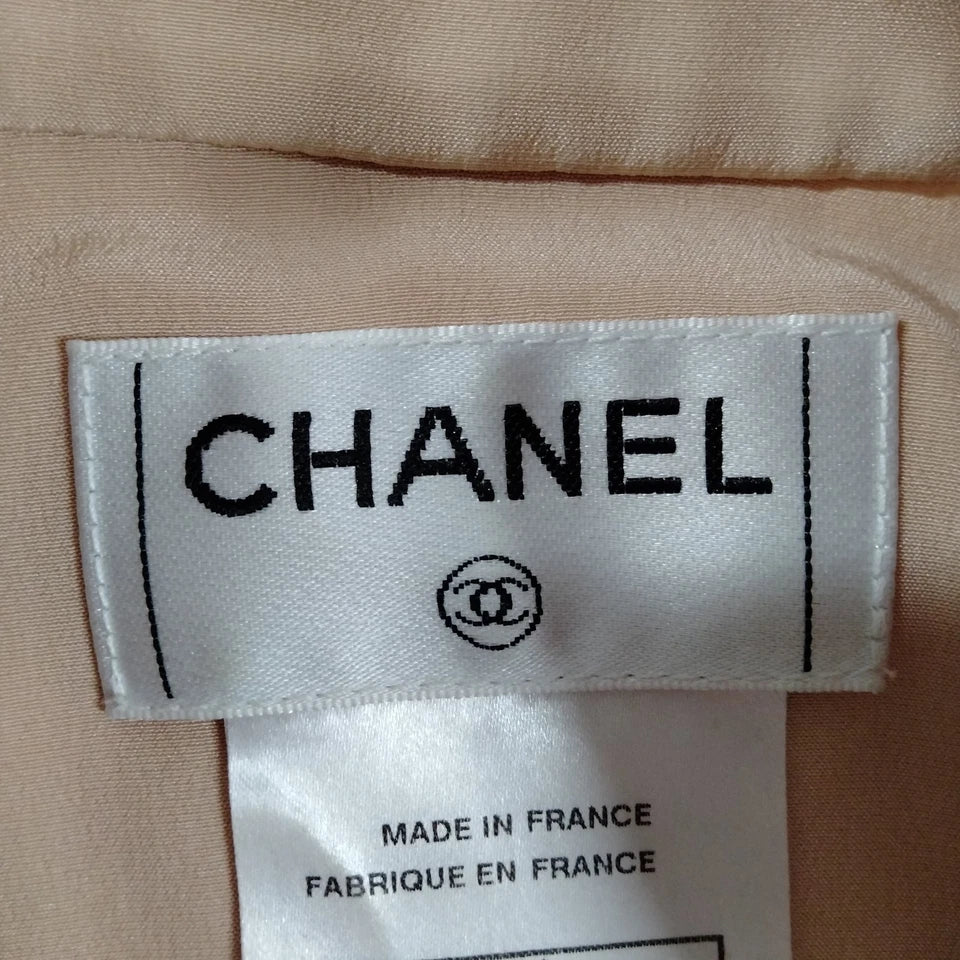 Chanel PARIS. Pink Silk Sleeveless Ruffles Top