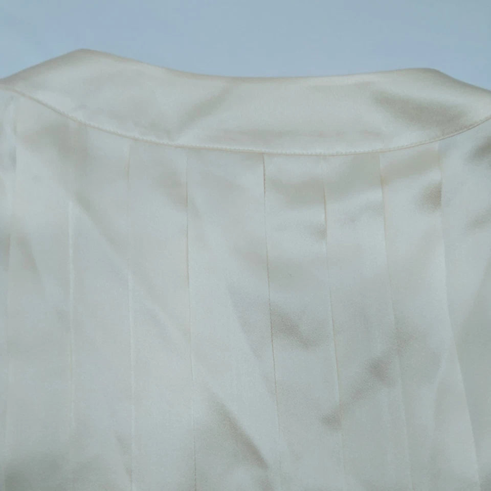 CHANEL PARIS. WHITE/IVORY LINEN CHANEL BUTTONS PLEATED TOP