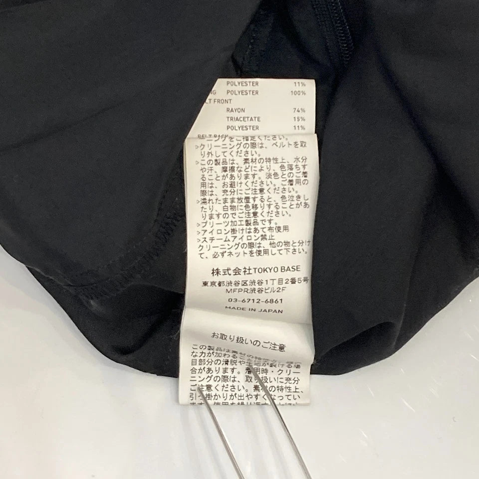 UNITED TOKYO JAPAN. Black Poly Blend Random Hem Flare Long Skirt