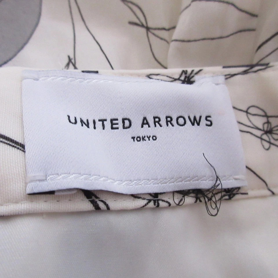 UNITED ARROWS JAPAN. White Flower Print Sheer Flare Maxi Skirt