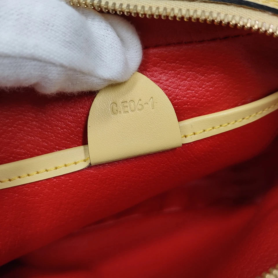 CELINE PARIS. Yellow Leather Gold Plated Hardware