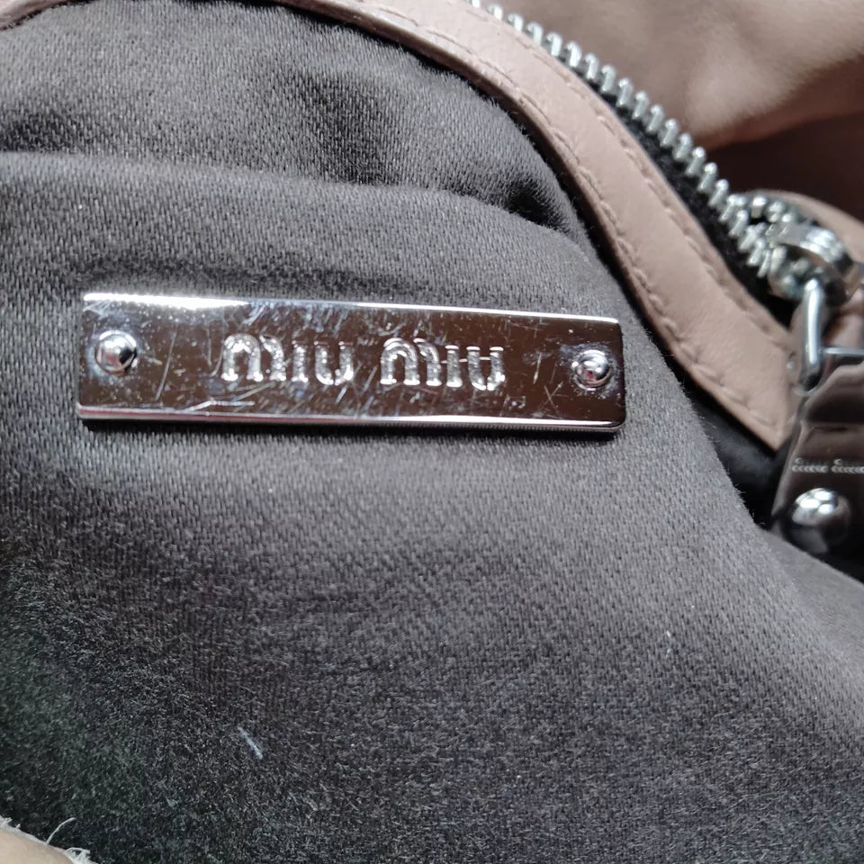 Miu Miu Italy. Brown Matelasse Leather Silverplated Hardware Shoulder Bag